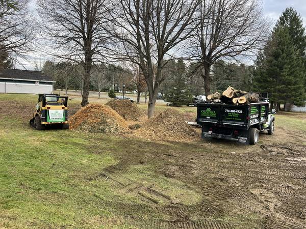 Log hauling and site cleanup with the loader