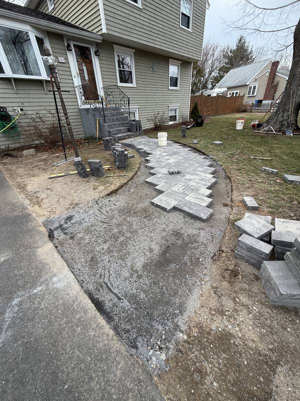 Paver field going down from the driveway