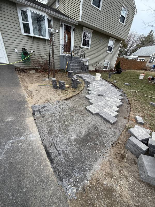 Curved Paver Front Walkway by Oliveira Landscaping in South Shore, MA