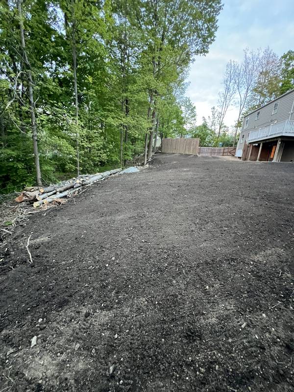 Backyard regraded and raked smooth for seeding