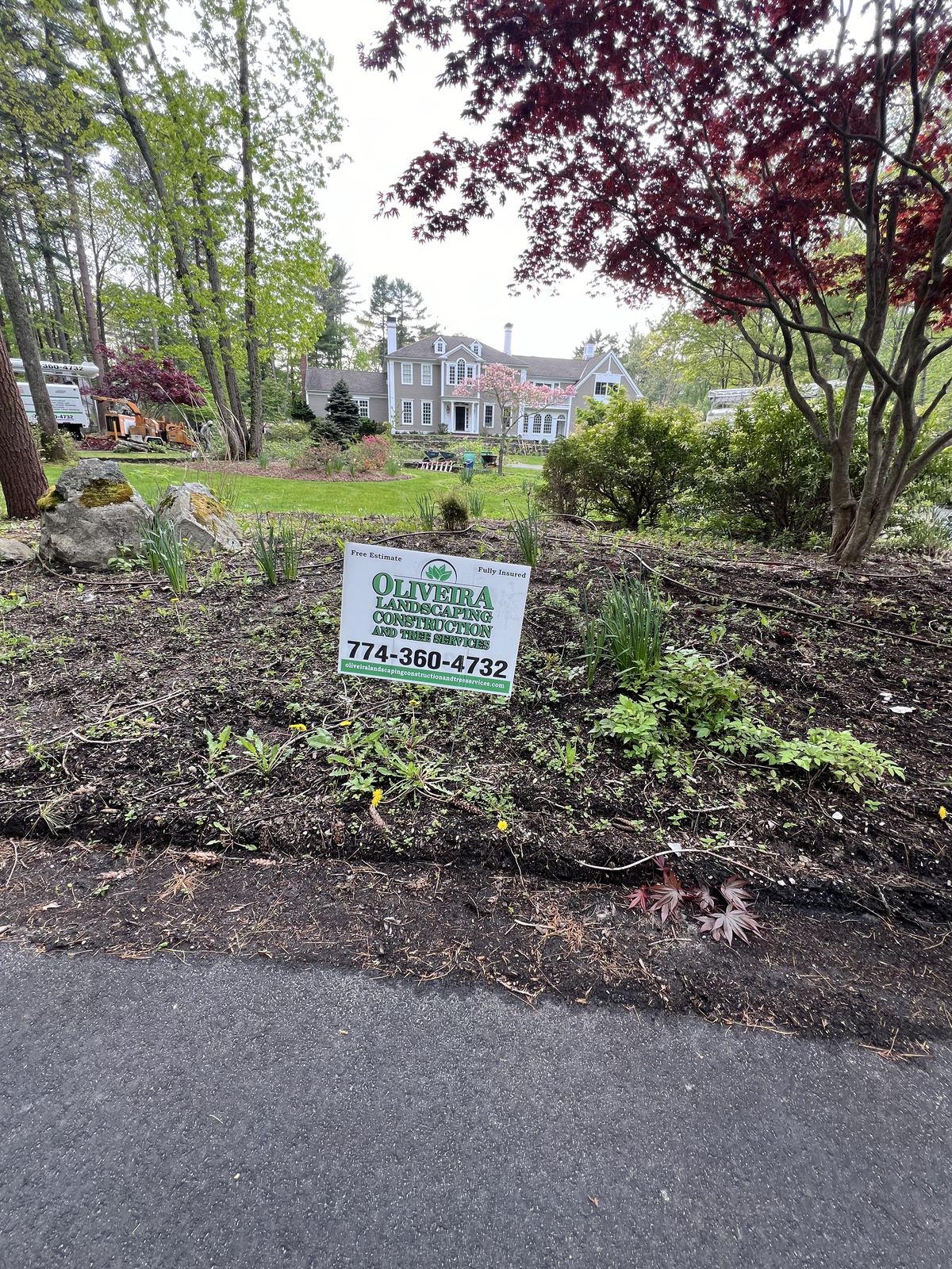 Restored bed at the driveway entrance