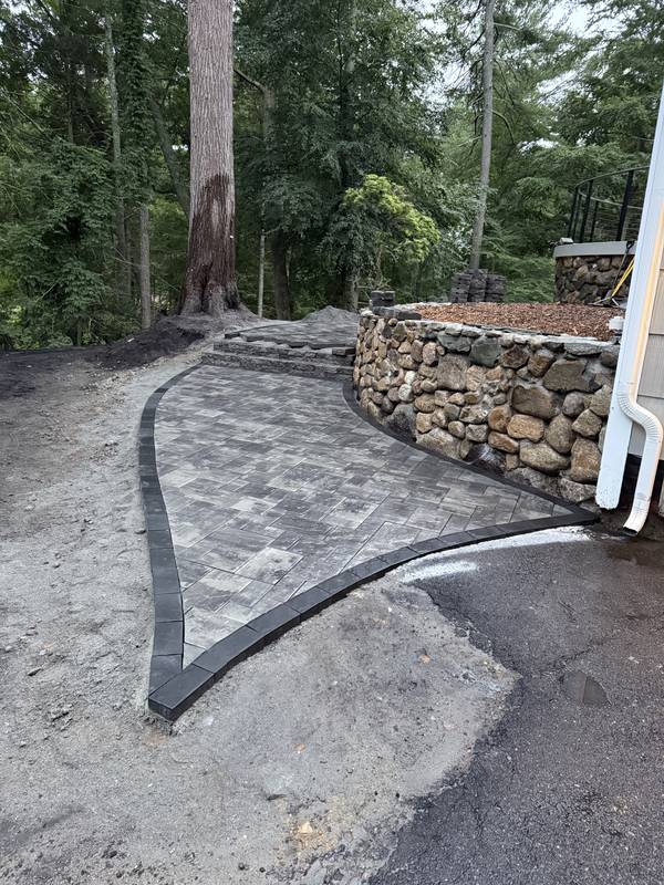 Paver landing taking shape with a contrasting charcoal border