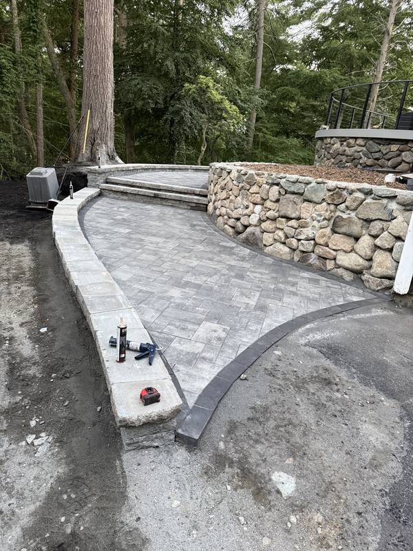 Granite curbing set along the new walkway edge