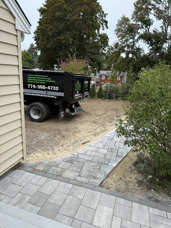 Paver walkway meeting the wide paver landing