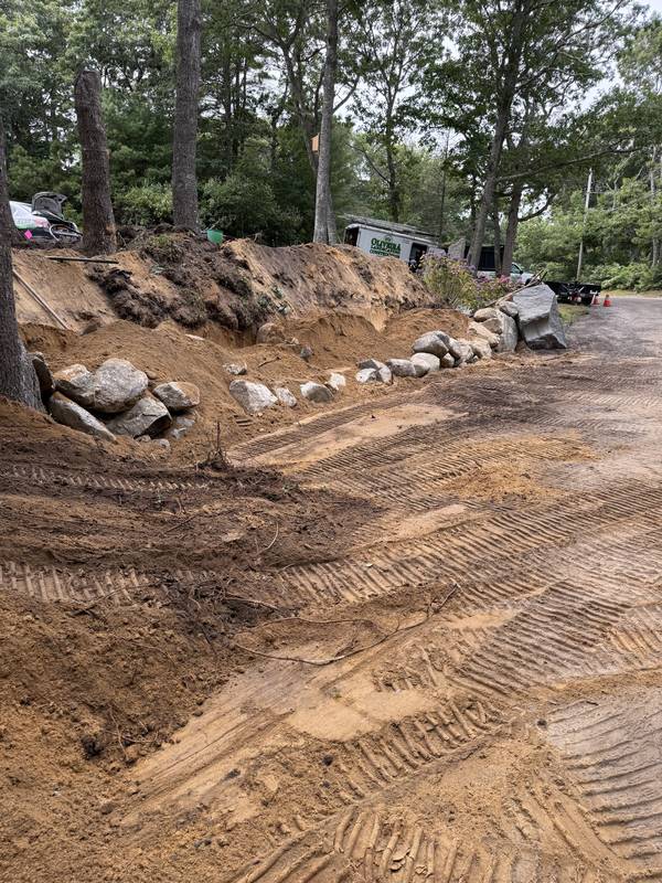 Boulder edge set along the regraded bank