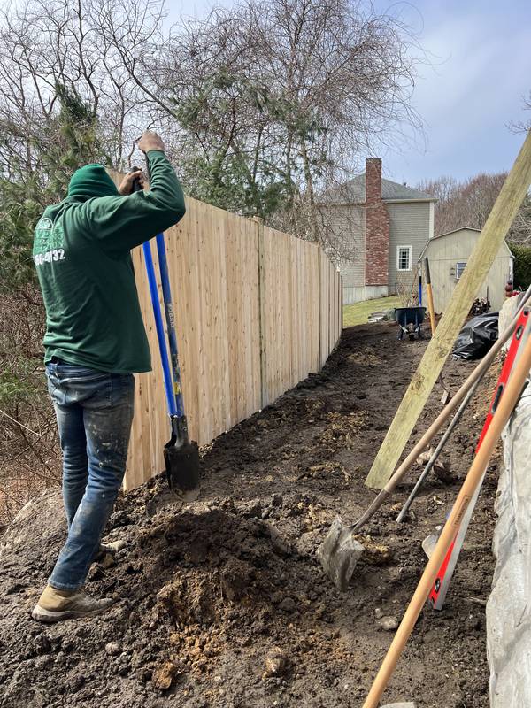 Setting posts for the new privacy fence